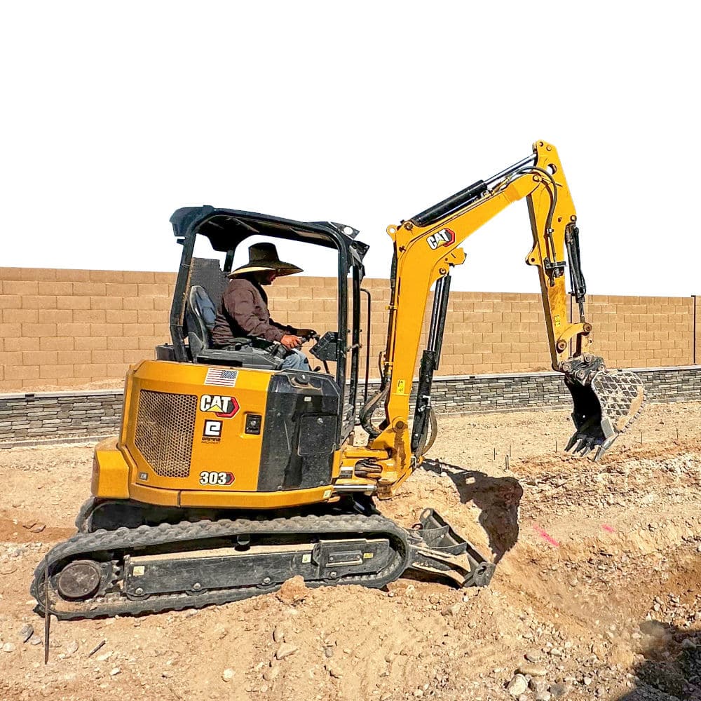 excavation contractor digs a pool with heavy equipment 1